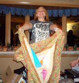 Annabelle thrilled with her t-shirt quilt